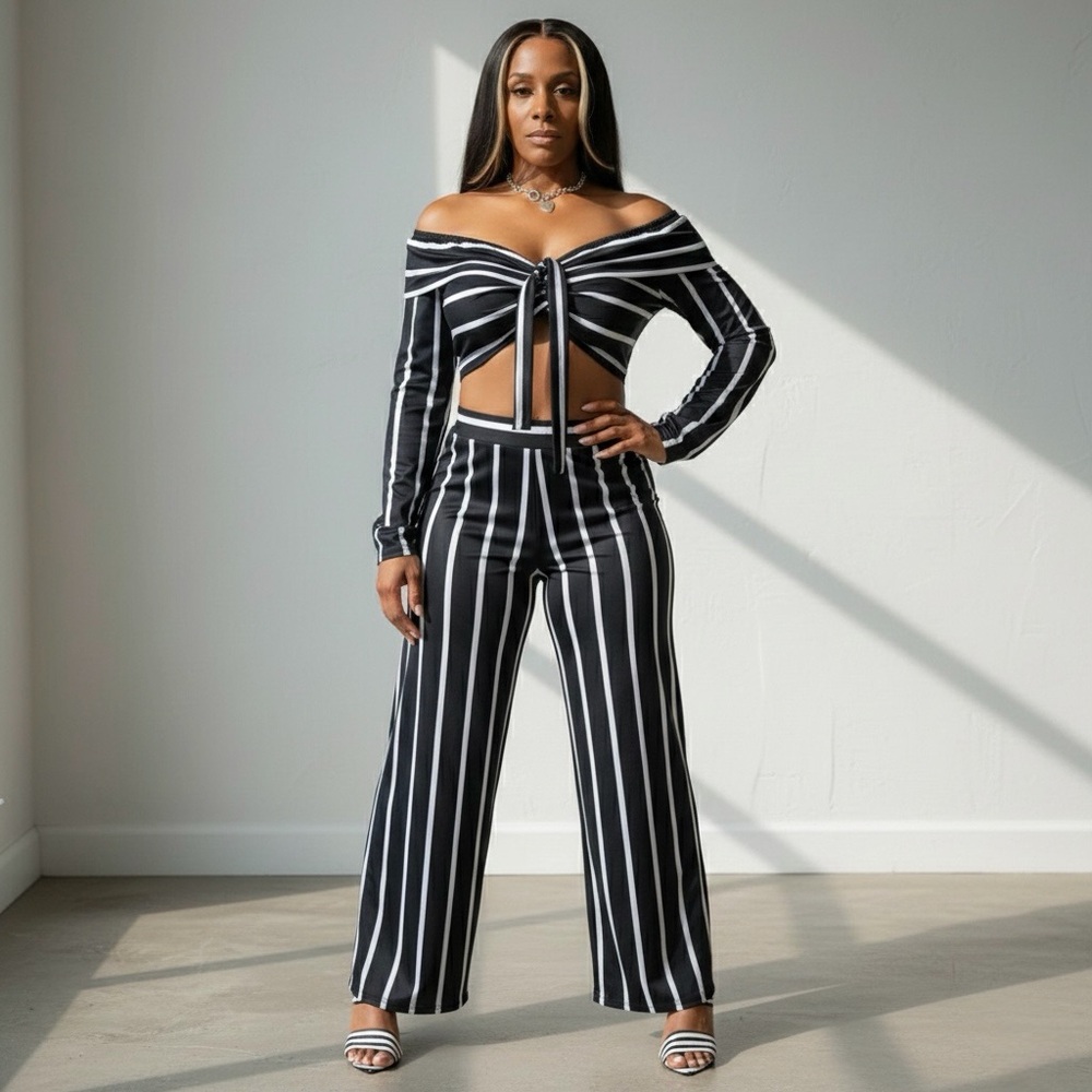 NEVER WORN BLACK PINSTRIPE TWO PIECE PANTS SET.